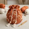 Terracotta Marigold Drawstring Pouch Free Crochet Pattern